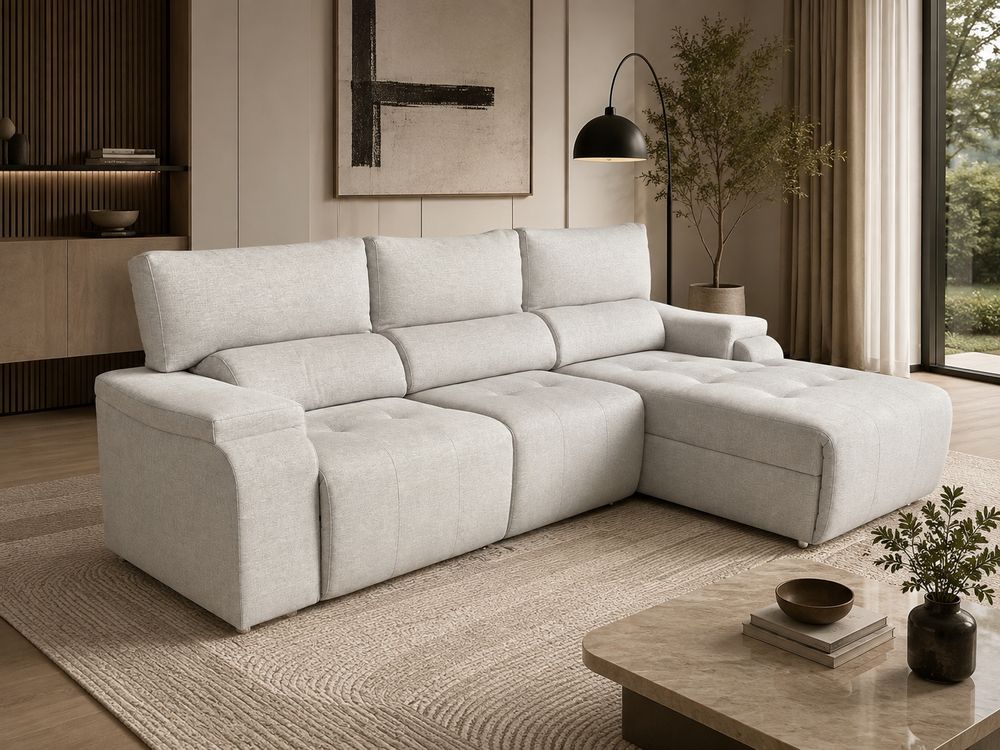 Sofá cinza claro com chaise e almofadas capitonê